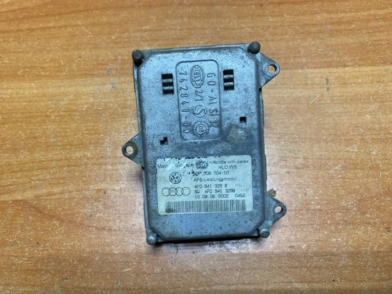 Блок управления фарой Audi A6 2009 C6