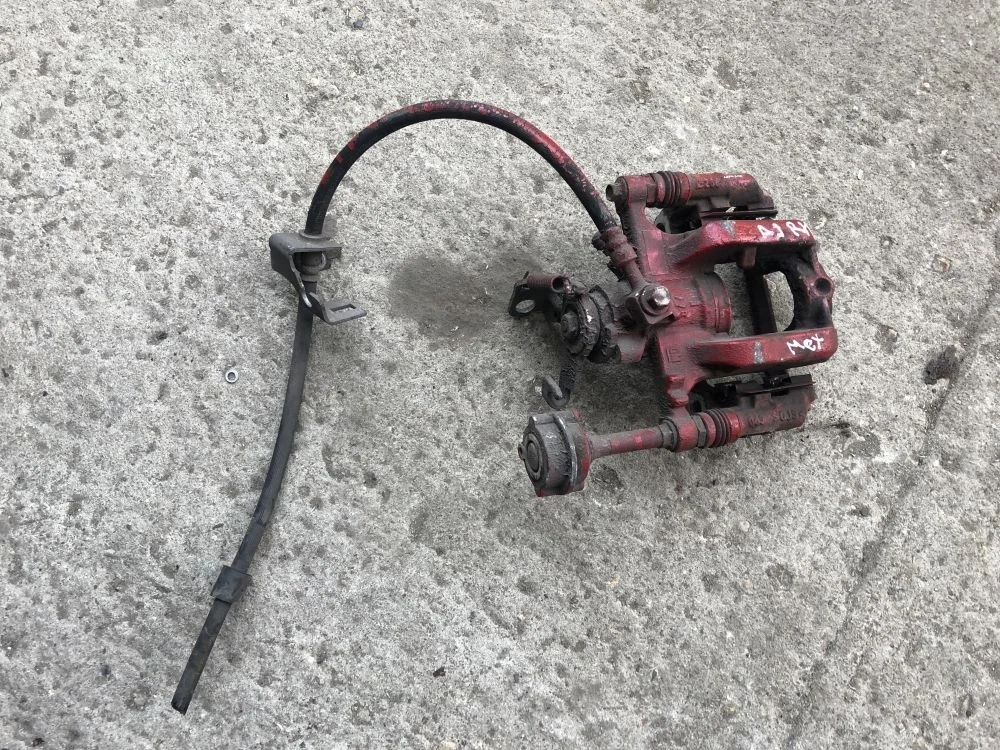 суппорт задний правый opel astra J cruze мех ручник