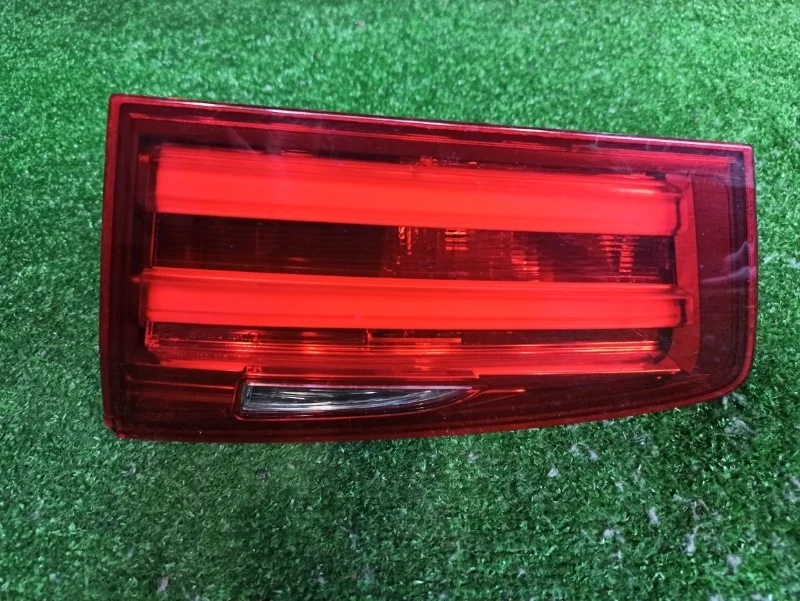 Фонарь в крышку багажника BMW F11