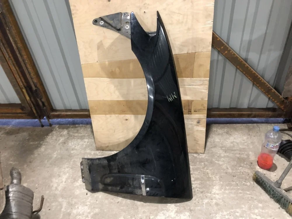 крыло переднее левое черное jaguar XF дорестаил