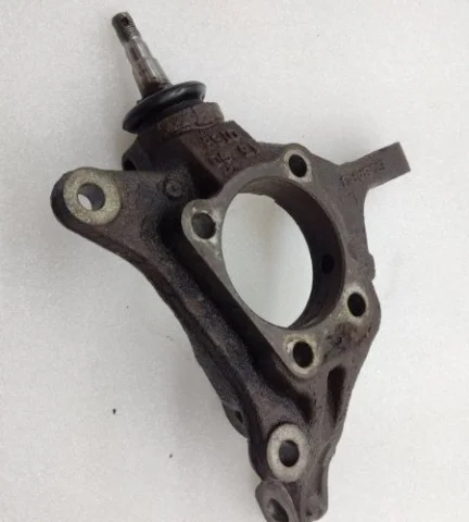 Кулак поворотный левый для Subaru Legacy Универсал BR/B14 2009-2015 на фотографиях