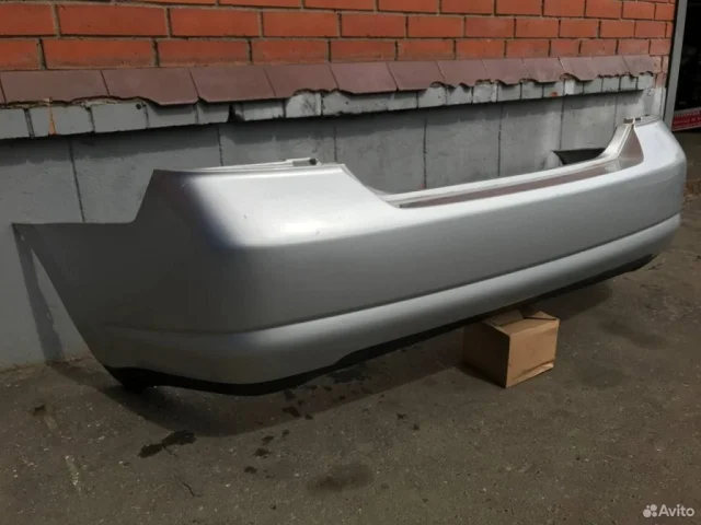 Бампер задний для Nissan Tiida SC11 Седан 2007-2014 на фотографиях