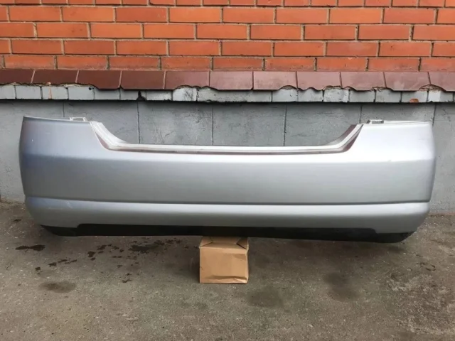 Бампер задний для Nissan Tiida SC11 Седан 2007-2014 на фотографиях