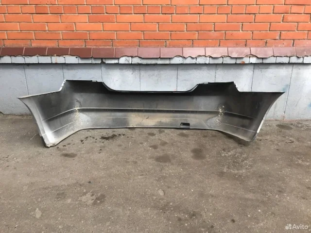 Бампер задний для Nissan Tiida SC11 Седан 2007-2014 на фотографиях