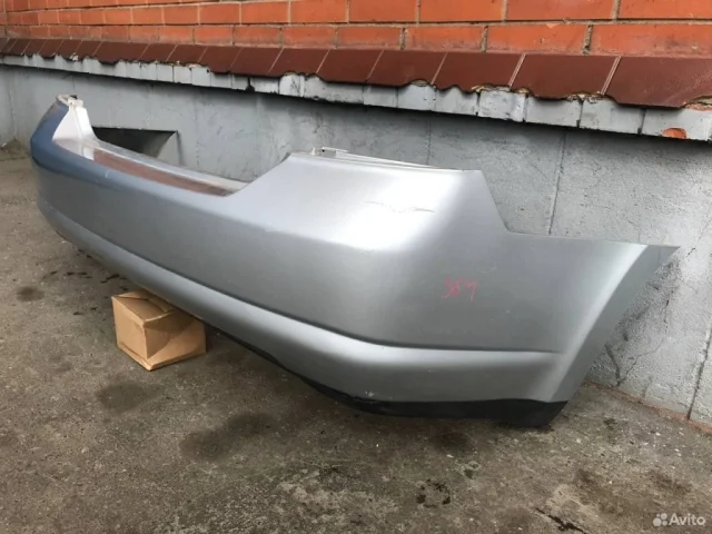 Бампер задний для Nissan Tiida SC11 Седан 2007-2014 на фотографиях