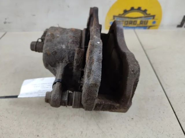 Суппорт передний левый для Suzuki Grand Vitara 2005-2014 на фотографиях