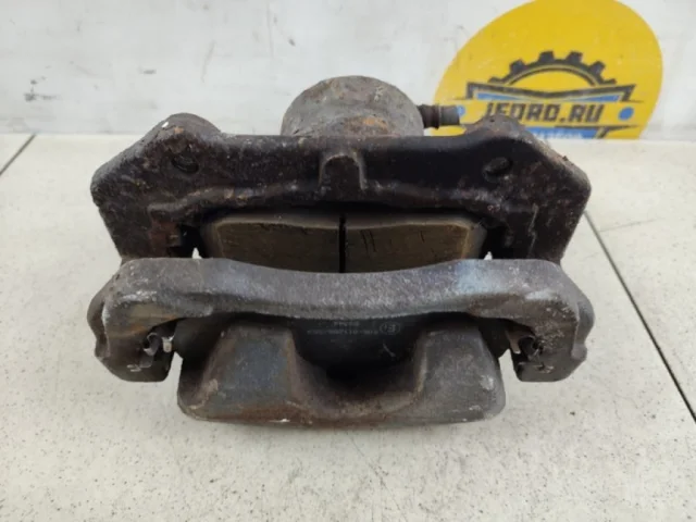 Суппорт передний левый для Suzuki Grand Vitara 2005-2014 на фотографиях