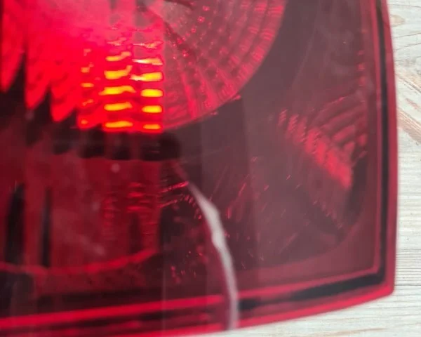 Фонарь левый для Volkswagen Touareg I (7L) 2002-2010 на фотографиях