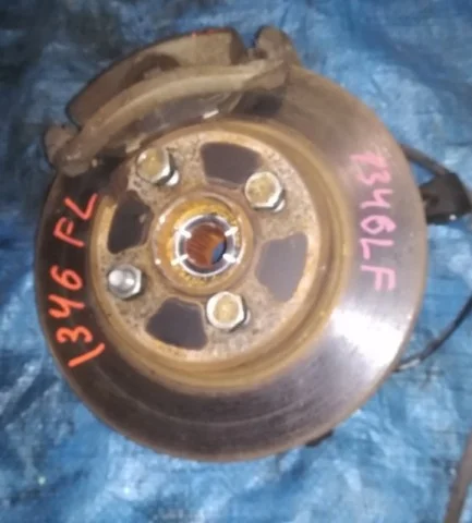 Кулак поворотный левый для Nissan Tiida SC11 Седан 2007-2014 на фотографиях