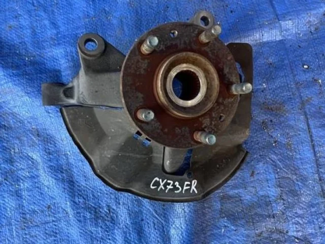 Кулак поворотный правый для Mazda CX 7 ER rest 2010-2012 на фотографиях