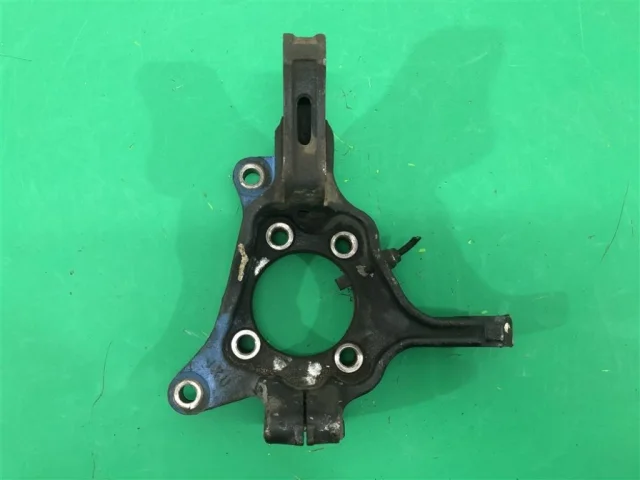 Кулак поворотный левый для Subaru Legacy BL/B13 2003-2009 на фотографиях