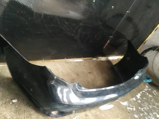 Бампер задний для Toyota Corolla E140/E150 Седан 2006-2013 на фотографиях