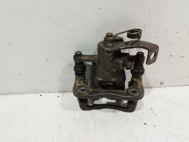 Суппорт задний левый для Hyundai Solaris 1 RB (2011-2013) на фотографиях