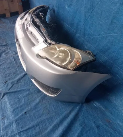 Бампер для Toyota Corolla E120/E130 Хэтчбек 2001-2007 на фотографиях