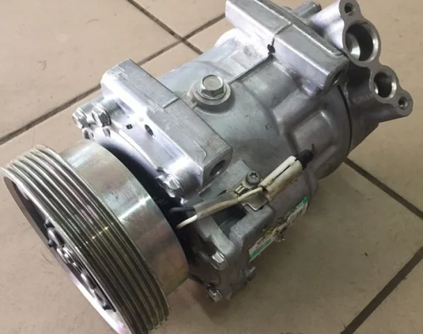 Компрессор кондиционера для Renault Logan 2007-2012 (Универсал KS) на фотографиях