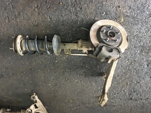 Суппорт передний левый для Suzuki Grand Vitara 2005-2014 на фотографиях