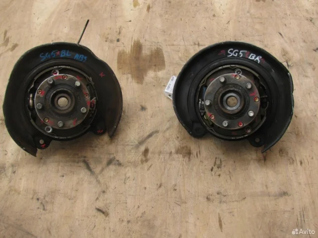 Кулак поворотный левый для Subaru Legacy Универсал BH/B12 1998-2003 на фотографиях