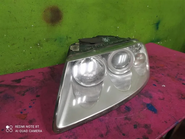 Фара ксенон левая для Volkswagen Touareg I (7L) 2002-2010 на фотографиях