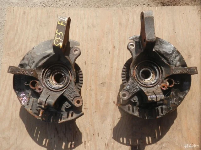 Кулак поворотный левый для Subaru Legacy Универсал BH/B12 1998-2003 на фотографиях