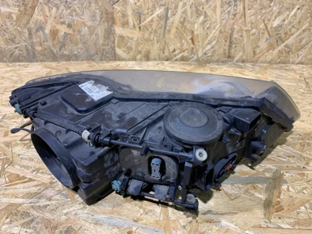 Фара ксенон левая для Volkswagen Touareg I (7L) 2002-2010 на фотографиях