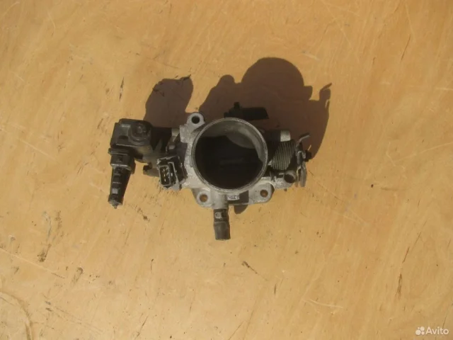 Дроссельная заслонка для Hyundai Tucson JM 2004-2009 на фотографиях
