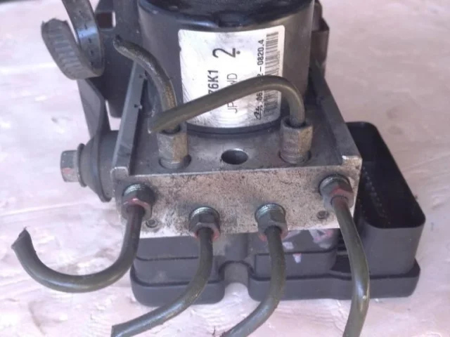 Блок ABS для Suzuki Grand Vitara 2005-2014 на фотографиях