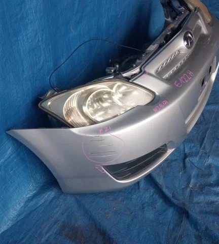Бампер для Toyota Corolla E120/E130 Хэтчбек 2001-2007 на фотографиях