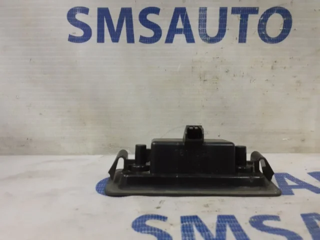 Фонарь подсветки номера левый для Volvo C30 MK 2006-2013 на фотографиях