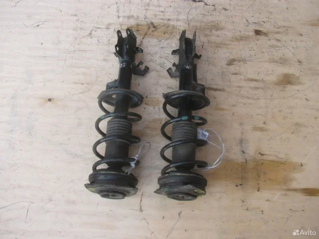 Амортизатор передний левый для Nissan Tiida C11 JDM Хэтчбек 2004-2012 на фотографиях