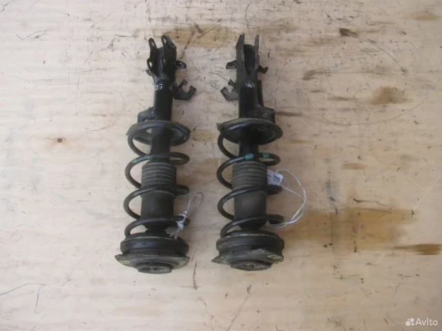 Амортизатор передний левый для Nissan Tiida C11 JDM Хэтчбек 2004-2012 на фотографиях