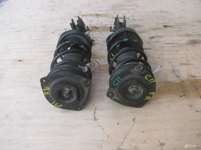 Амортизатор передний левый для Nissan Tiida C11 JDM Хэтчбек 2004-2012 на фотографиях