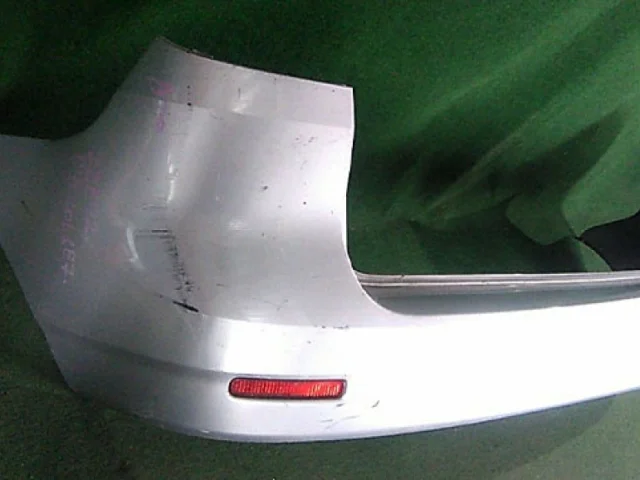 Бампер задний для Toyota Corolla E120/E130 Хэтчбек 2001-2007 на фотографиях