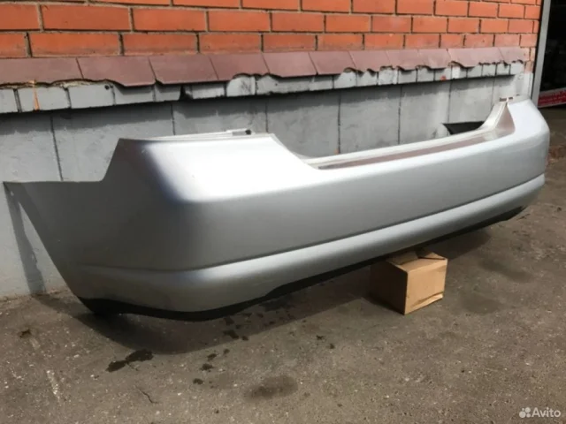 Бампер задний для Nissan Tiida SC11 Седан 2007-2014 на фотографиях