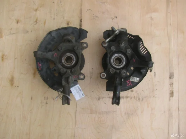 Кулак поворотный правый для Toyota Corolla E140/E150 Седан 2006-2013 на фотографиях