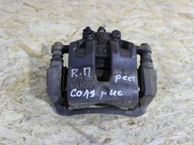 Суппорт задний левый для Hyundai Solaris 1 RB (2011-2013) на фотографиях