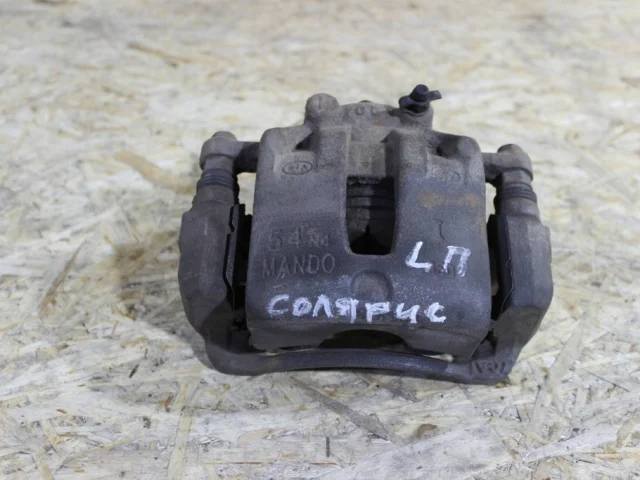 Суппорт задний левый для Hyundai Solaris 1 RB (2011-2013) на фотографиях