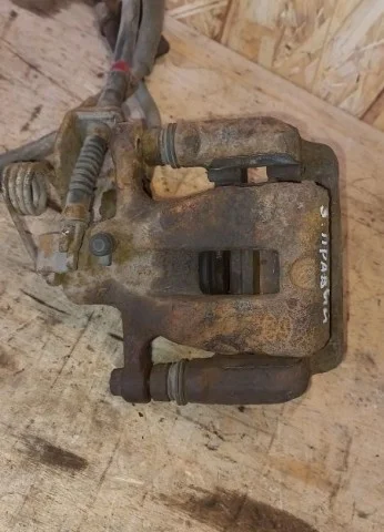 Суппорт задний правый для Hyundai Solaris 1 RB (2011-2013) на фотографиях