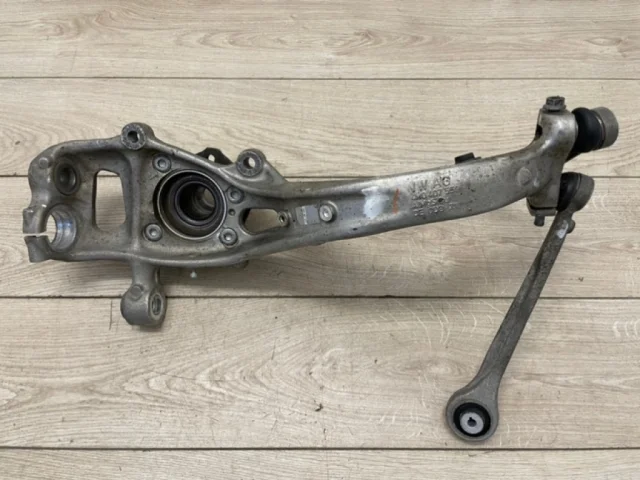 Кулак поворотный левый для Audi Q7 4M 2015+ на фотографиях