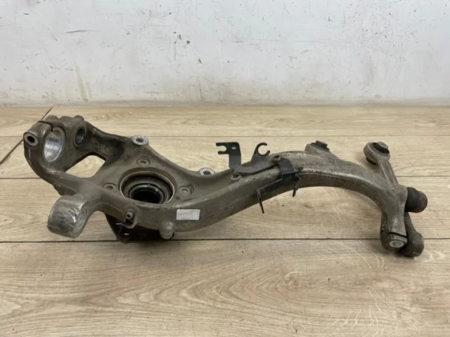 Кулак поворотный левый для Audi Q7 4M 2015+ на фотографиях