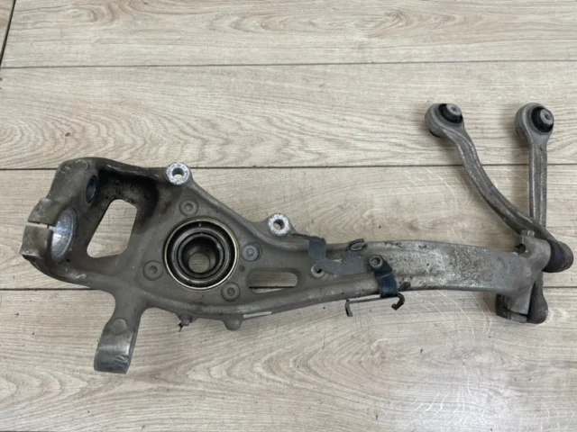 Кулак поворотный левый для Audi Q7 4M 2015+ на фотографиях