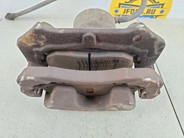 Суппорт передний левый для Suzuki Grand Vitara 2005-2014 на фотографиях
