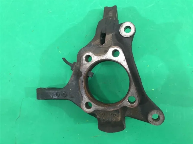 Кулак поворотный левый для Subaru Legacy BL/B13 2003-2009 на фотографиях