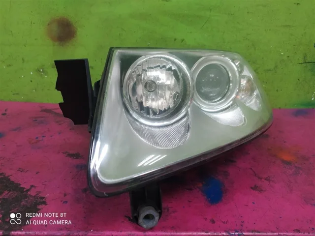 Фара ксенон левая для Volkswagen Touareg I (7L) 2002-2010 на фотографиях