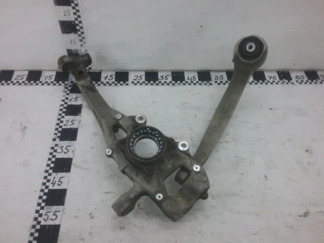 Кулак поворотный левый для Audi Q7 4M 2015+ на фотографиях