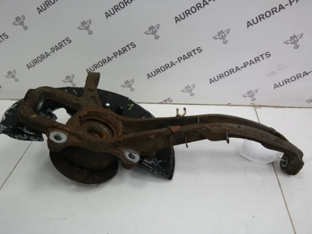 Кулак поворотный левый для Audi Q7 4L 2005-2015 на фотографиях