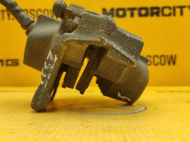 Суппорт задний левый для Mercedes-Benz E class W210 1995-2002 на фотографиях