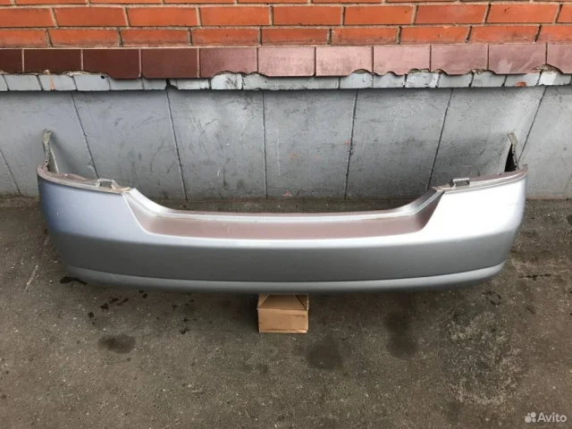 Бампер задний для Nissan Tiida SC11 Седан 2007-2014 на фотографиях