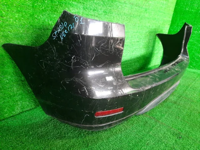 Бампер задний для Toyota Corolla E120/E130 Хэтчбек 2001-2007 на фотографиях