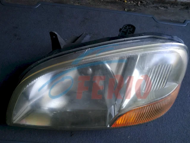 Фара левая для Suzuki Ignis 2000-2003 на фотографиях