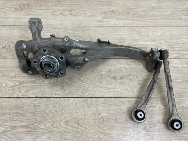 Кулак поворотный левый для Audi Q7 4M 2015+ на фотографиях